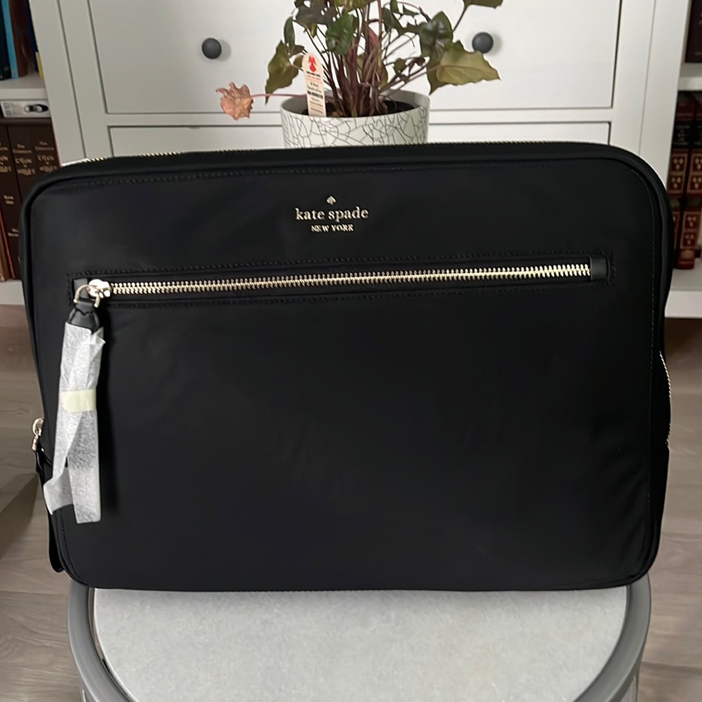 Kate Spade Chelsea Laptop Sleeve with Strap used once great condition.